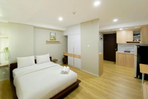 Spacious and Warm Studio Daan Mogot City Apartment By Travelio